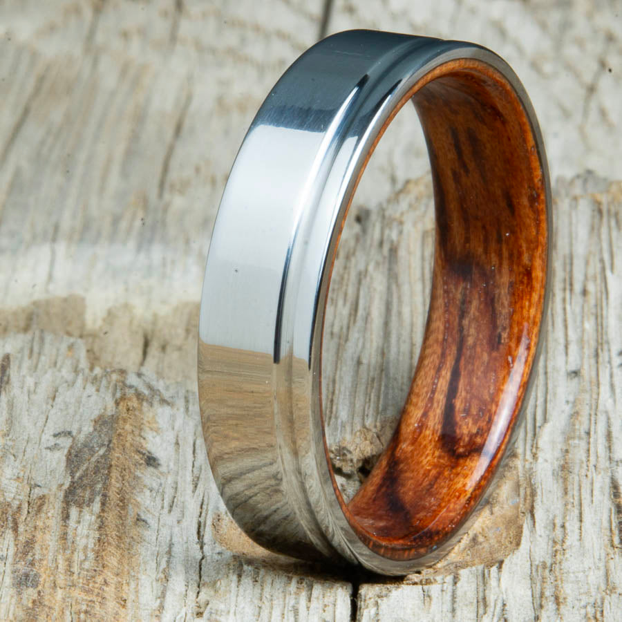 Titanium wedding bands with Bubinga interior. Unique handcrafted rings and bands made by Peacefield Titanium.