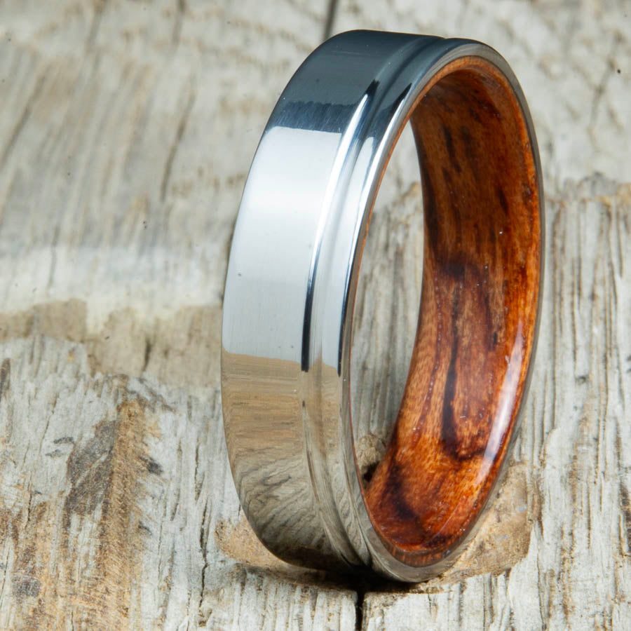 Titanium wedding bands with Bubinga interior. Unique handcrafted rings and bands made by Peacefield Titanium.