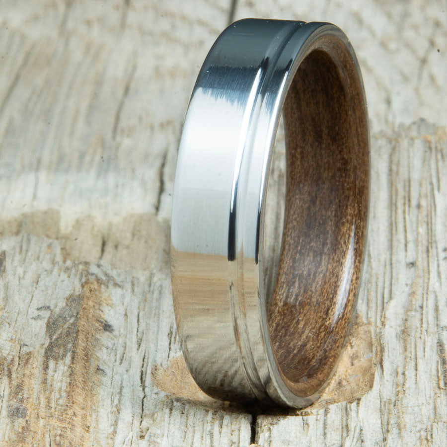 Titanium wedding bands with Walnut interior. Unique handcrafted rings and bands made by Peacefield Titanium.