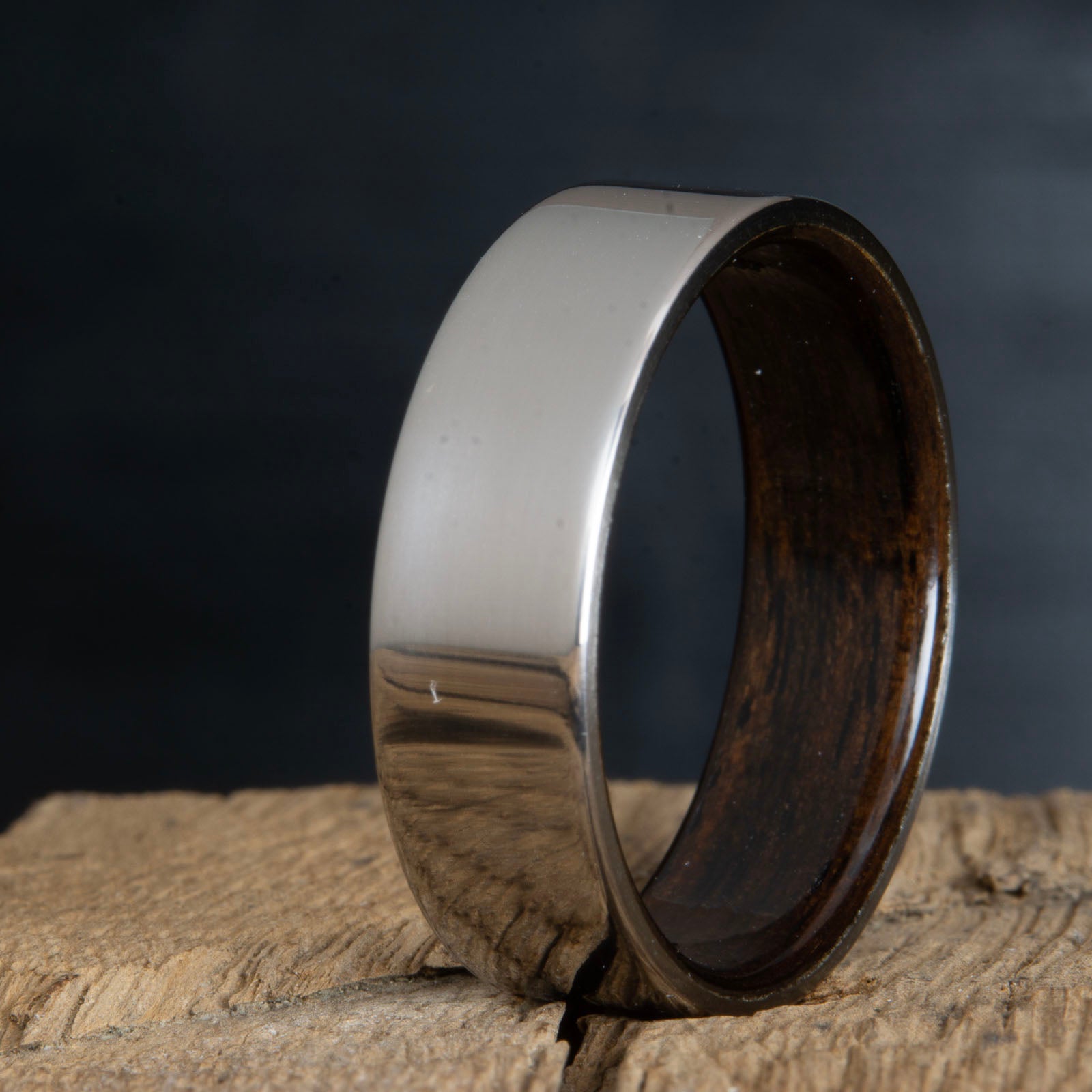 Ebony wooden ring with titanium