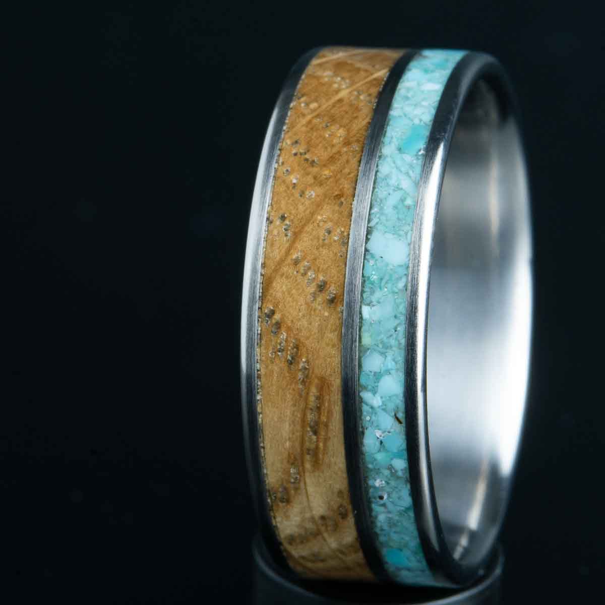 Titanium ring with turquoise and whiskey barrel wood ring