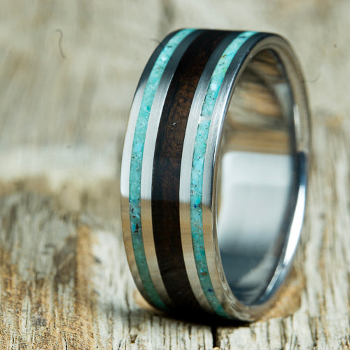 wedding ring with turquoise and ebony wood inlay.