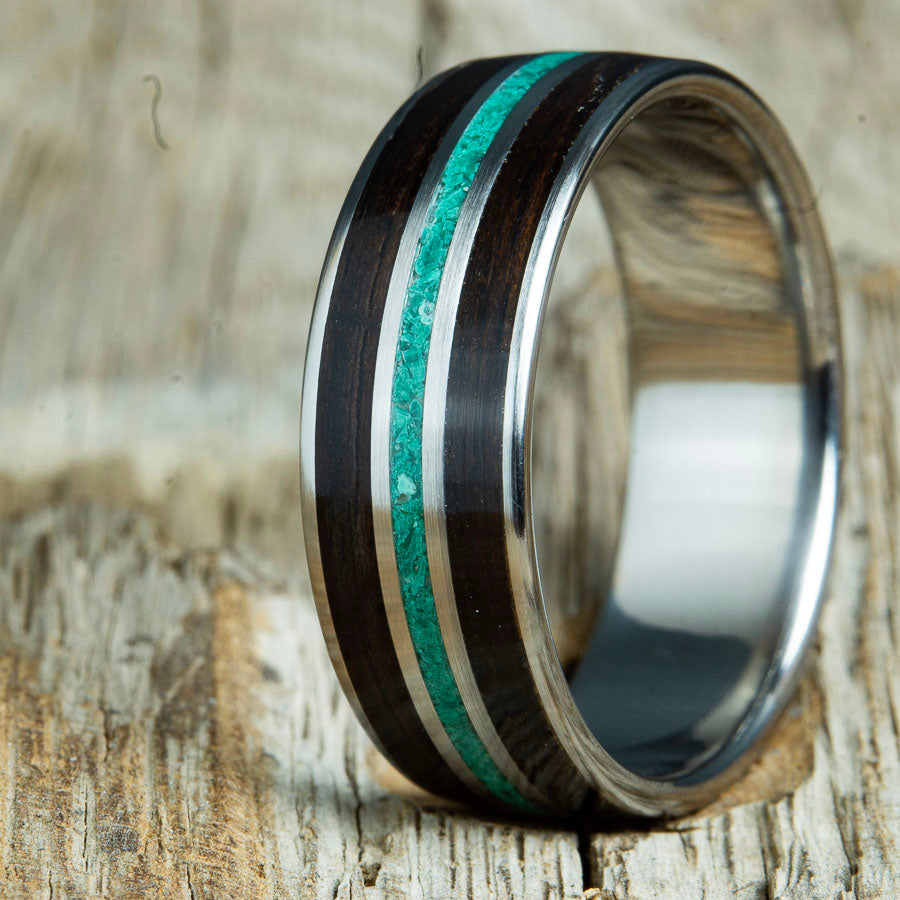 Wood ring for men with Ebony wood and Malachite stone on polished titanium custom made by Peacefield Titanium.