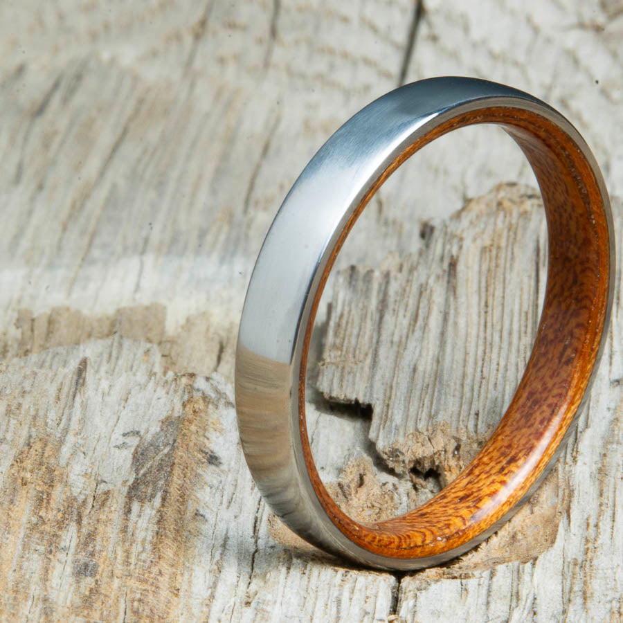 Classic domed womens wood wedding band with Rosewood. Unique wooden rings for women made by Peacefield Titanium.