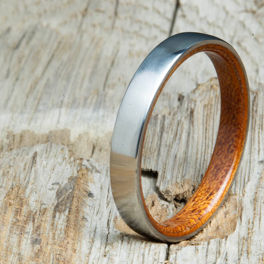 Classic domed womens wood wedding band with Rosewood. Unique wooden rings for women made by Peacefield Titanium.