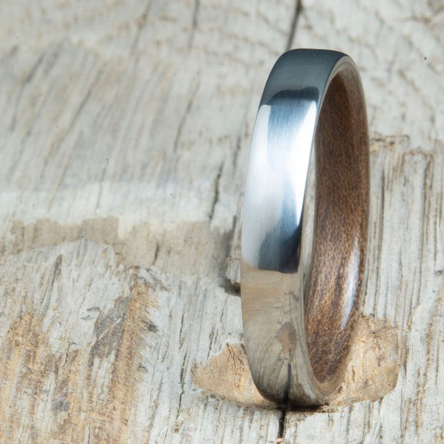 Classic domed womens wood wedding band with Walnut wood. Unique wooden rings for women made by Peacefield Titanium.