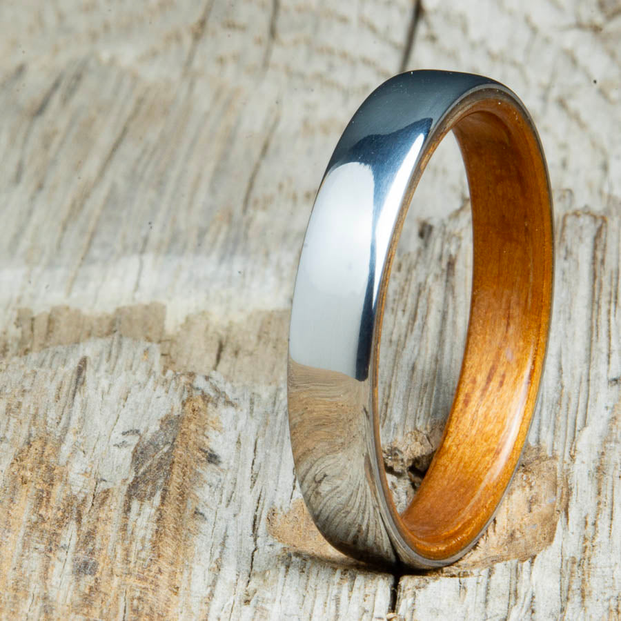 Classic domed womens wood wedding band with Koa wood. Unique wooden rings for women made by Peacefield Titanium.