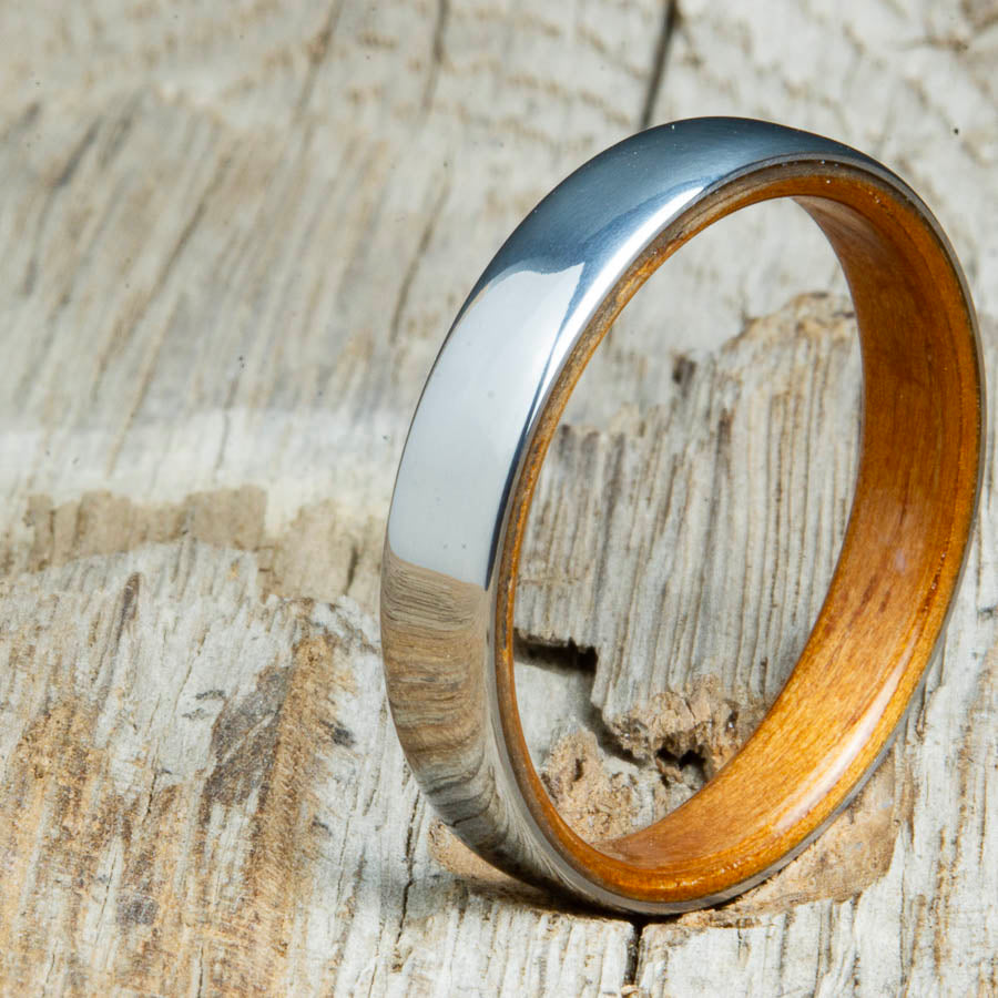 Classic domed womens wood wedding band with Koa wood. Unique wooden rings for women made by Peacefield Titanium.