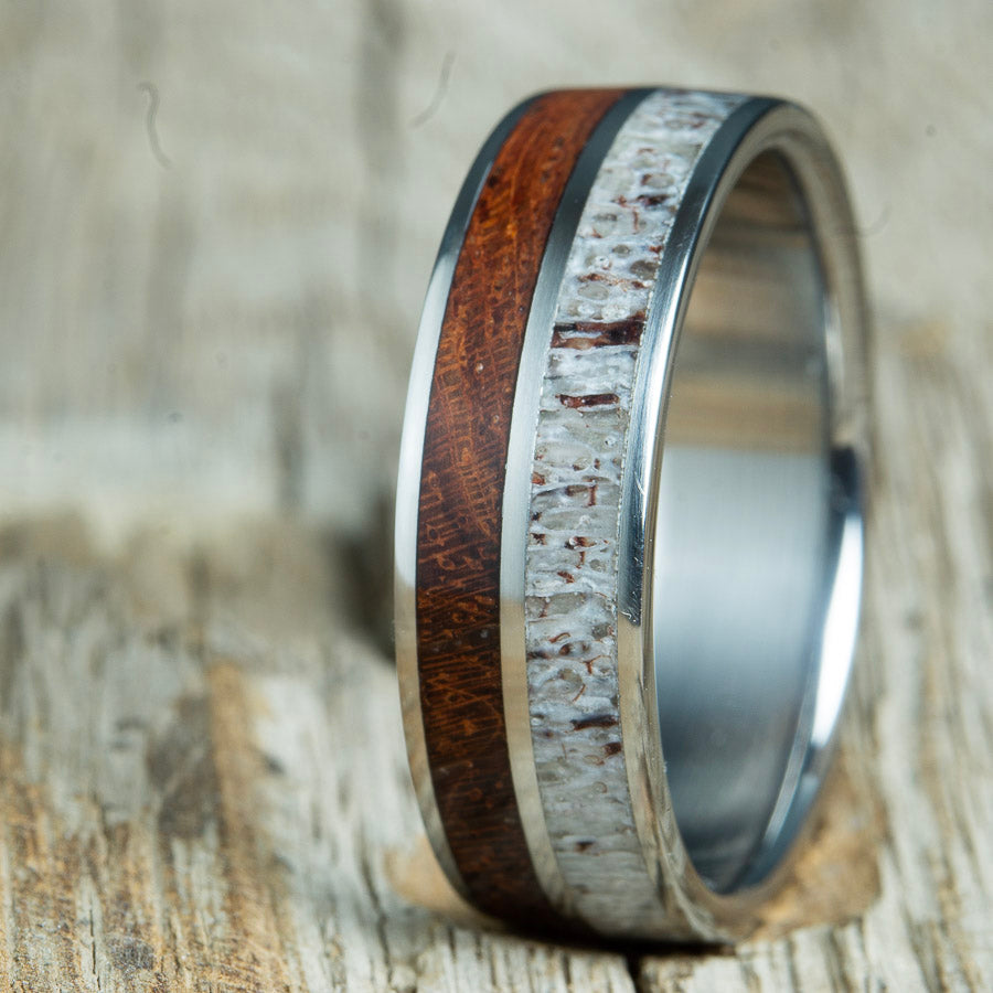 bubinga wooden wedding ring with antler inlay. Custom handcrafted unique wedding rings made by www.peacefieldtitanium.com