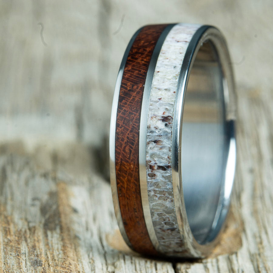 bubinga wooden wedding ring with antler inlay. Custom handcrafted unique wedding rings made by www.peacefieldtitanium.com