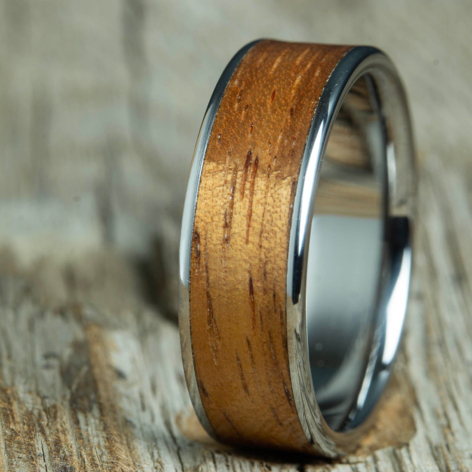 mens wood wedding band with Koa wood inlay and polished titanium. Handcrafted wood wedding rings with real Koa wood inlay for Men. Any finger size from 5 to 14 and widths from 5mm to 10mm. Free shipping, 30 day returns and lifetime warranty includes refinishing