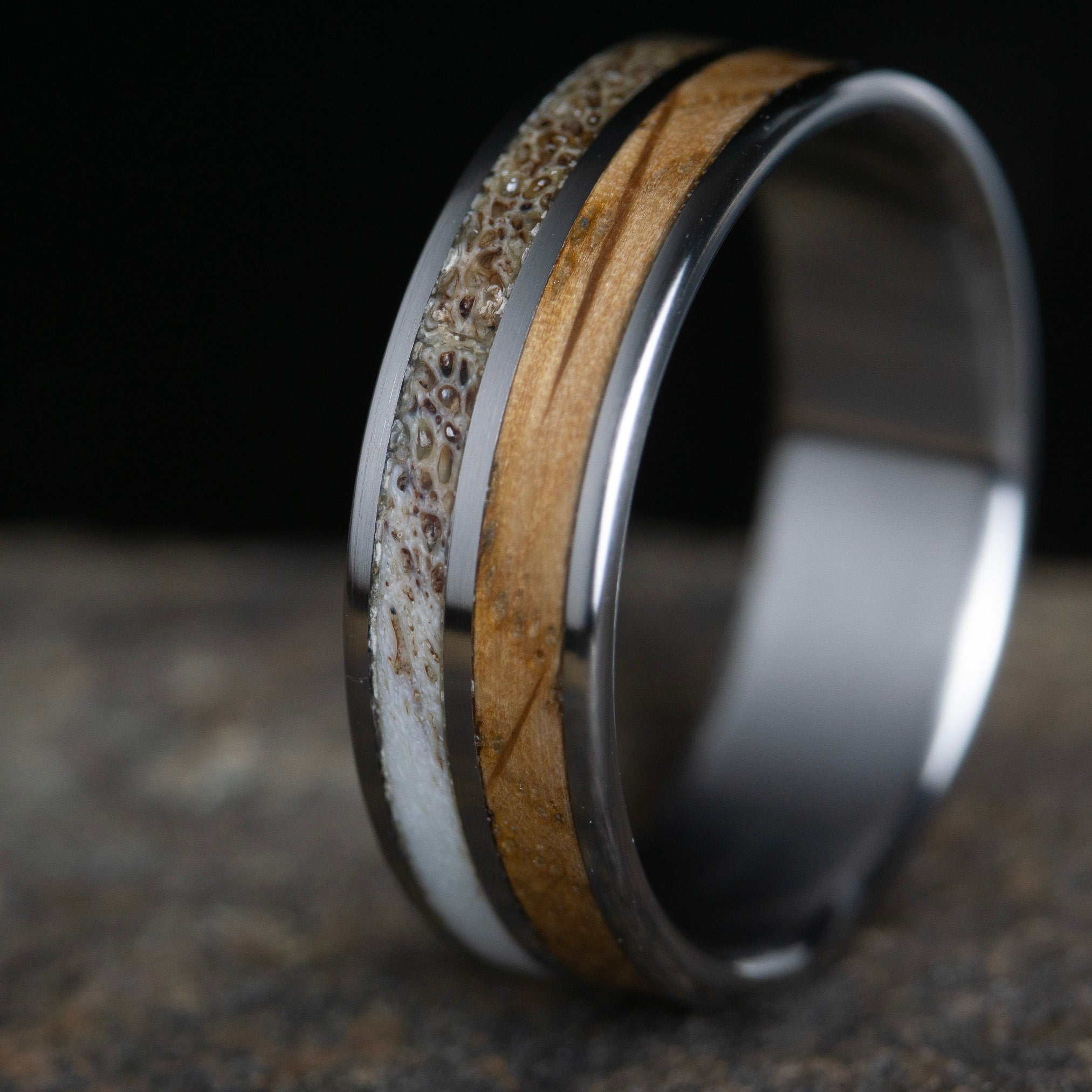 Antle ring with whiskey barrel wood wedding ring