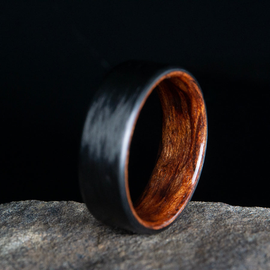 Carbon fiber wedding ring with bubinga wood interior