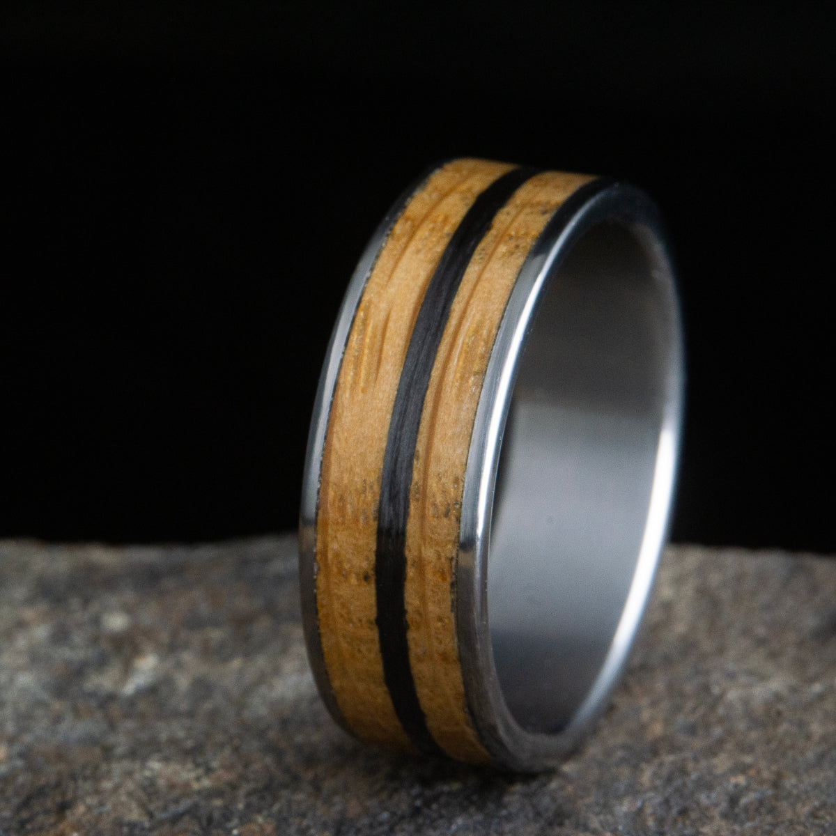 whiskey barrel wood ring with carbon fiber inlay