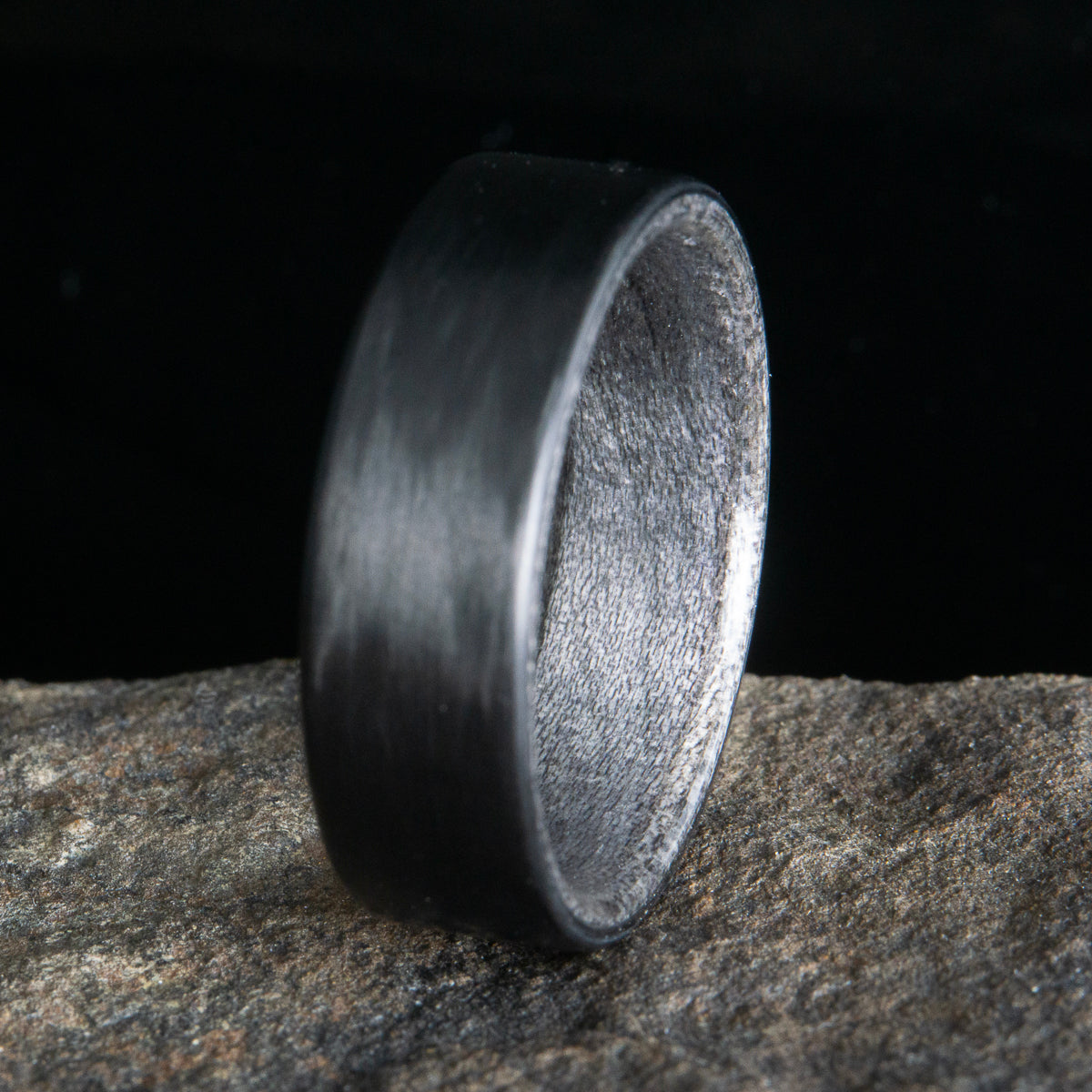 weathered barnwood with black carbon fiber ring
