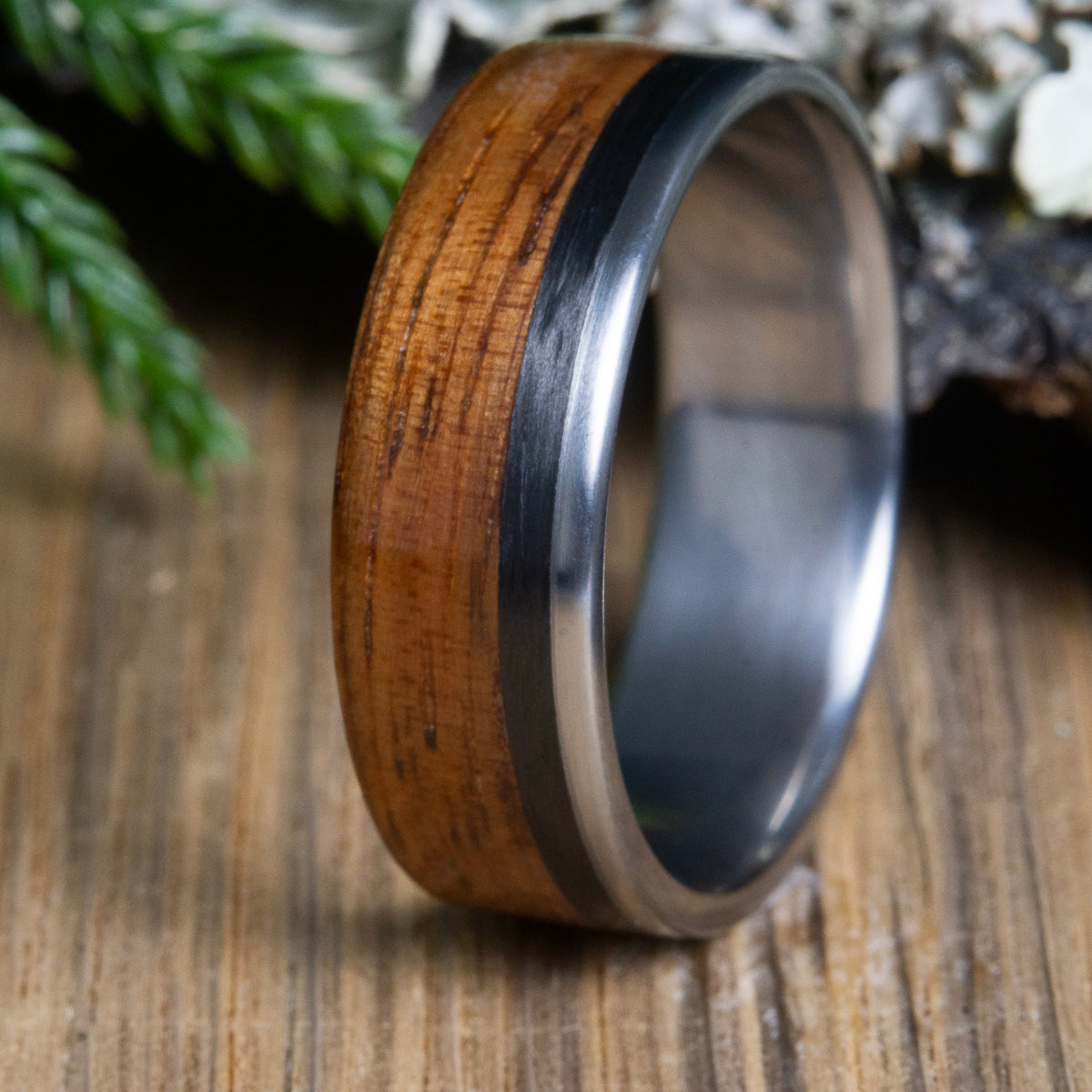 Koa wood ring with carbon fiber and titanium ring