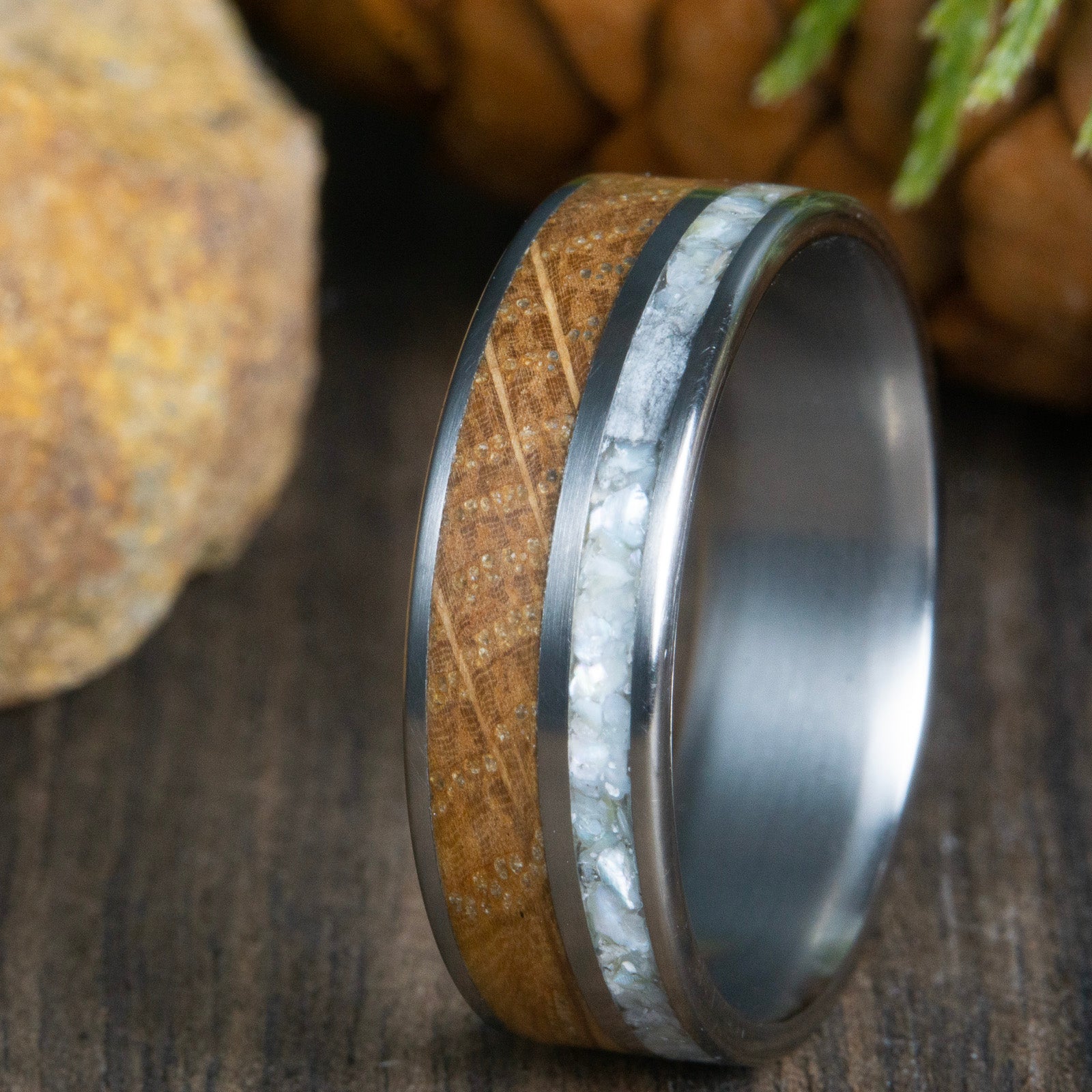 Whiskey barrel wood ring with mother of pearl inlay