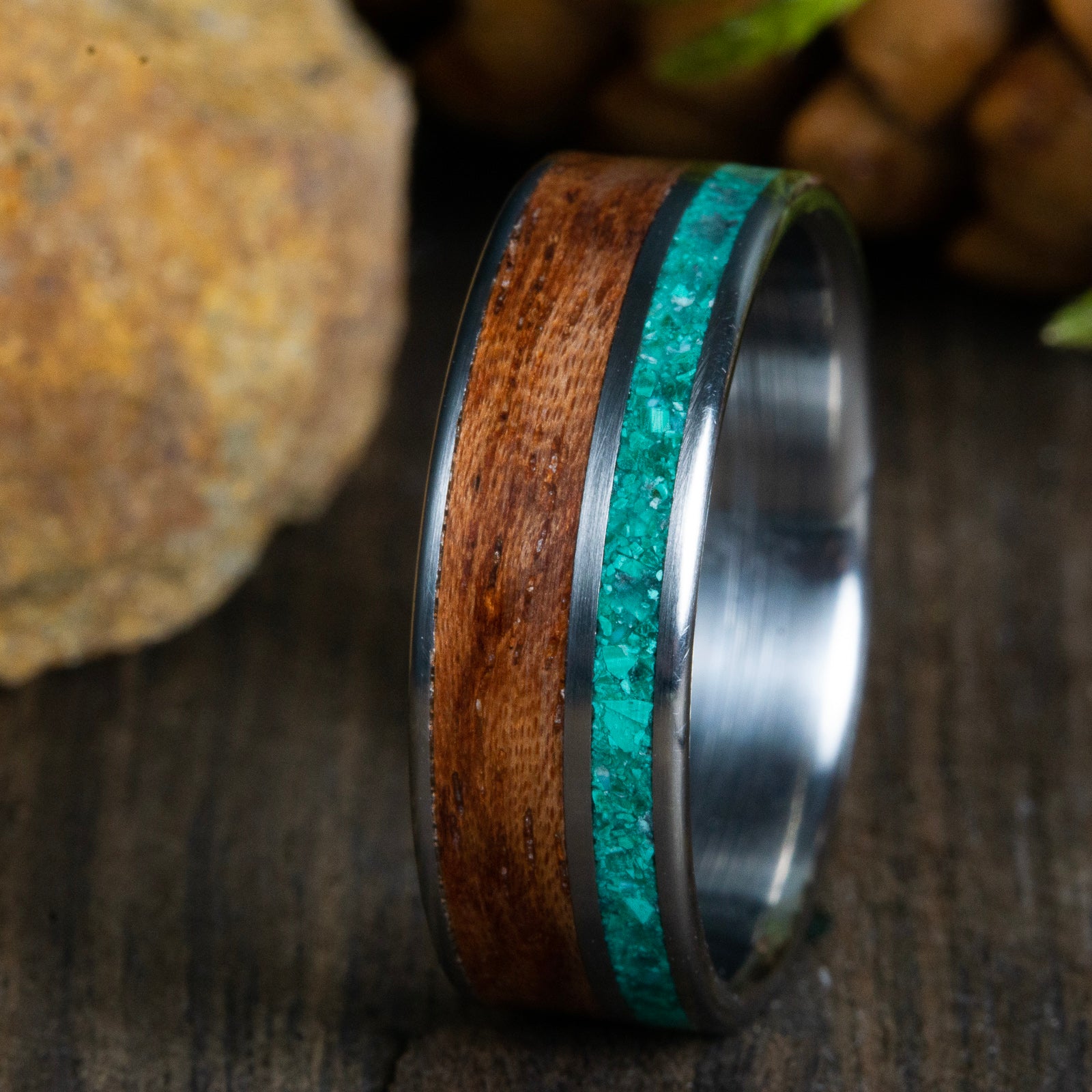 Wood ring with malachite and titanium