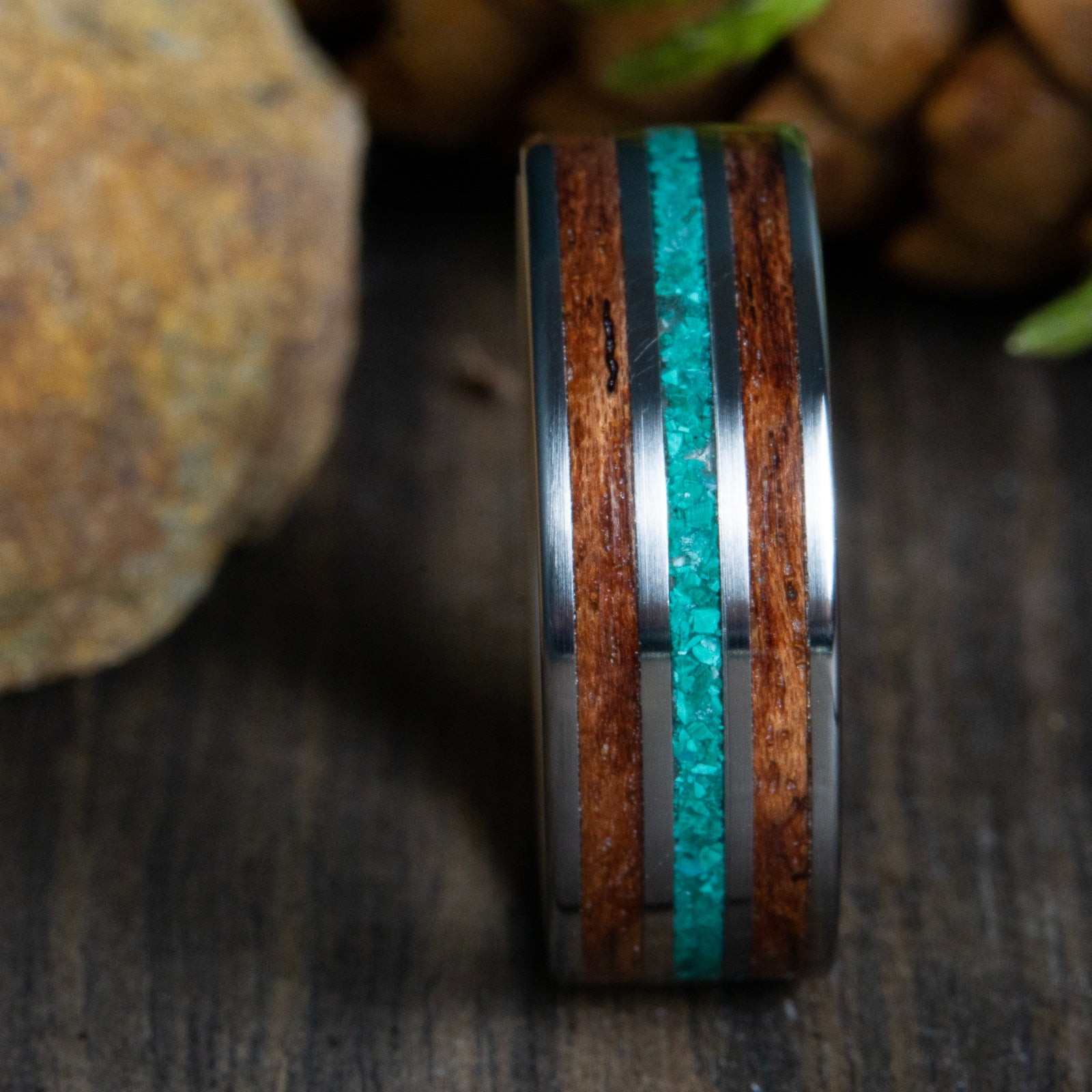 bubinga wood inlay with titanium and malachite