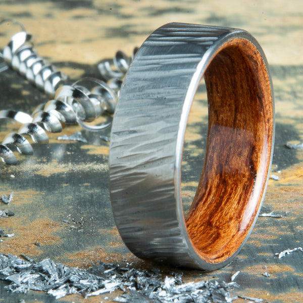 Bubinga wood lined hammered titanium wedding band