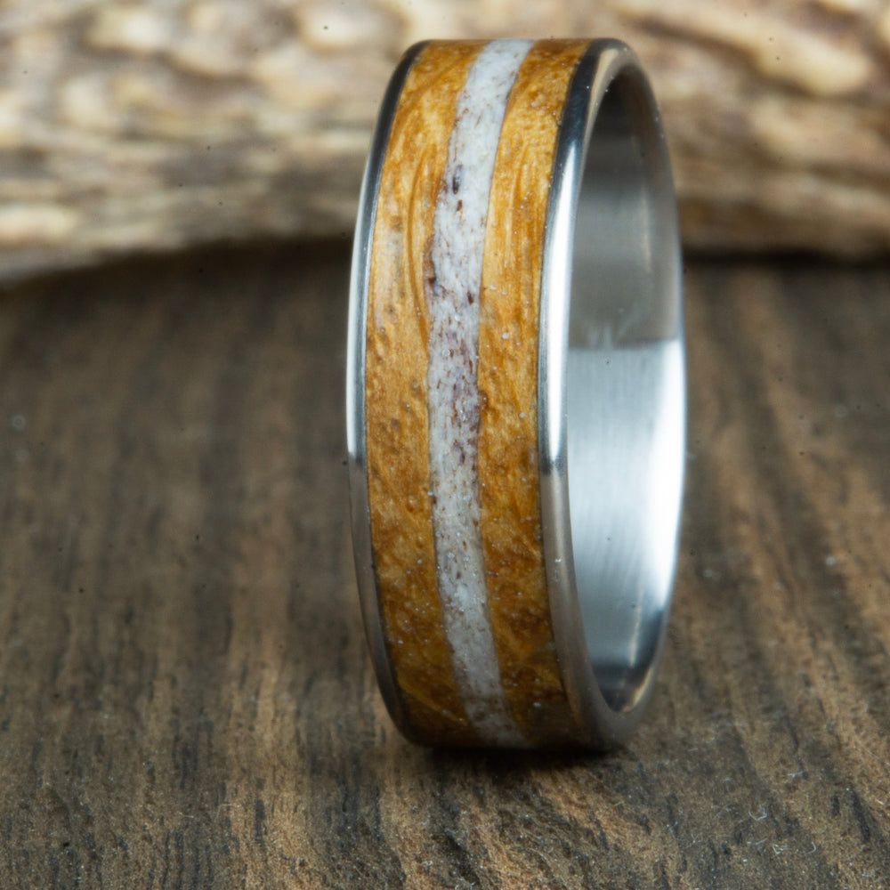 titanium with bourbon barrel wood and Antler inlay ring