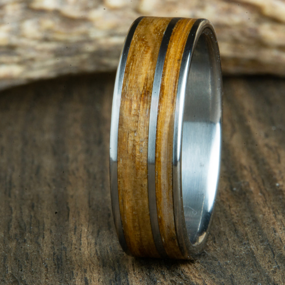 Titanium ring made with Whiskey barrel wood