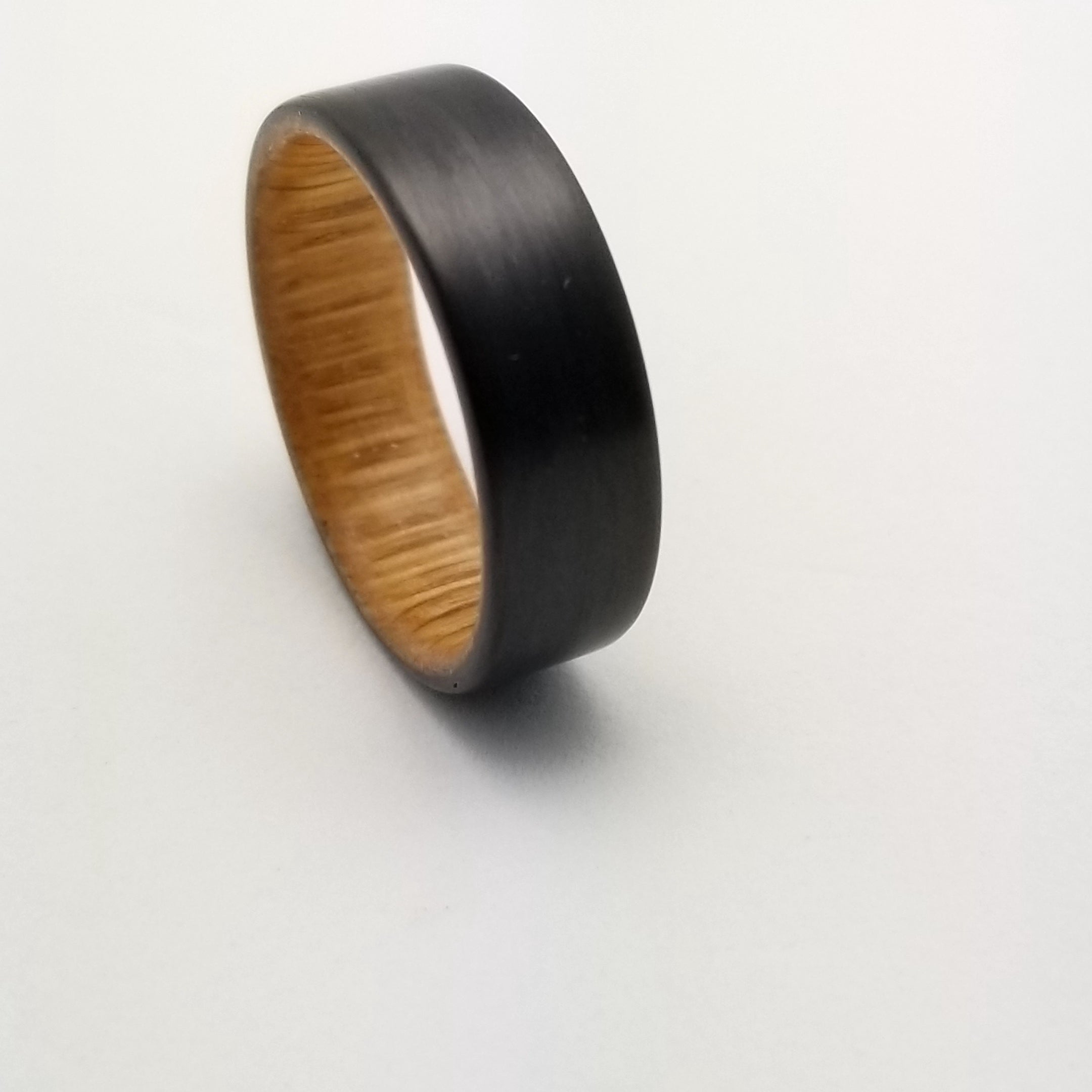 Carbon fiber and Reclaimed Barn Wood Wedding Ring