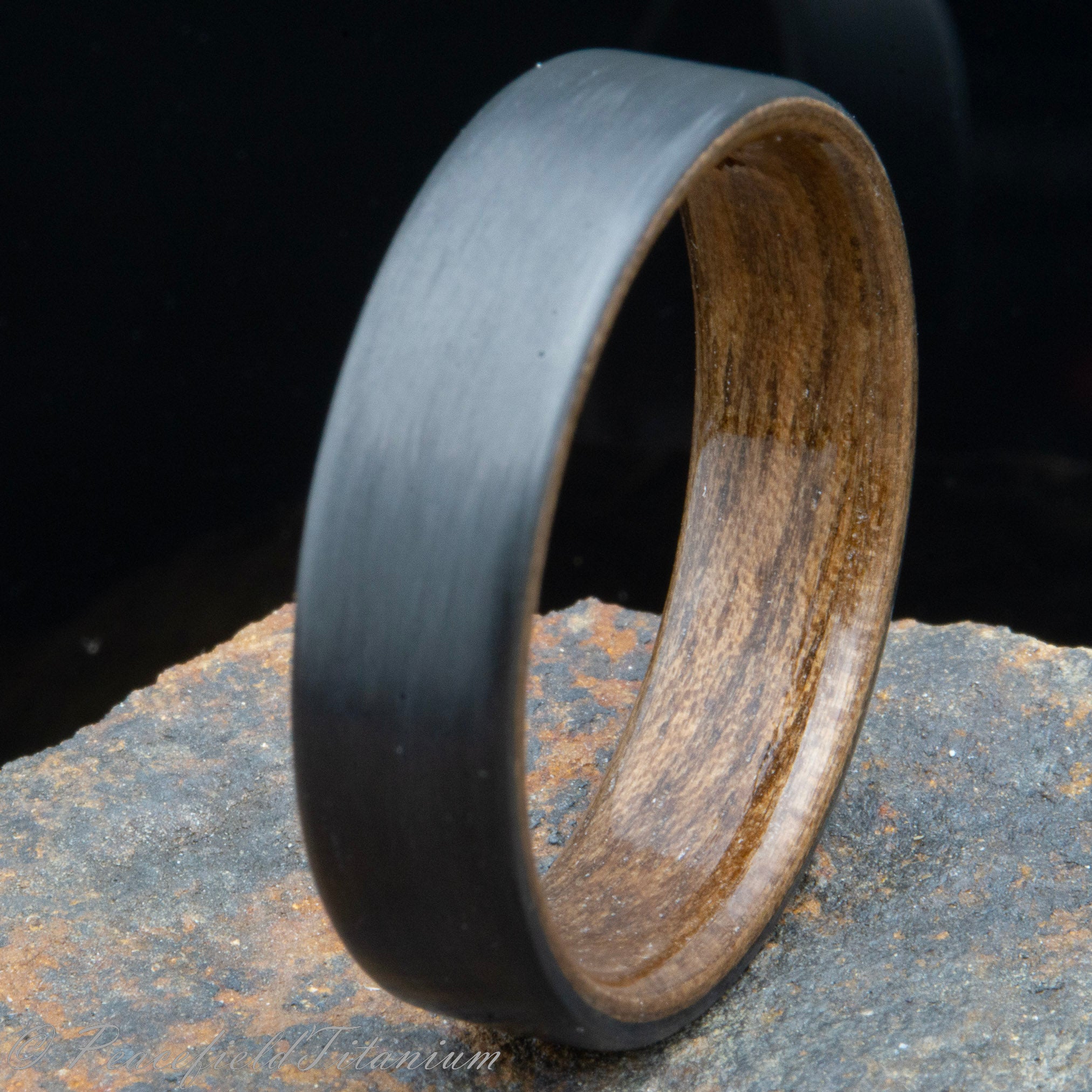 "The Storm" salvaged Black Walnut and Carbon fiber ring for men
